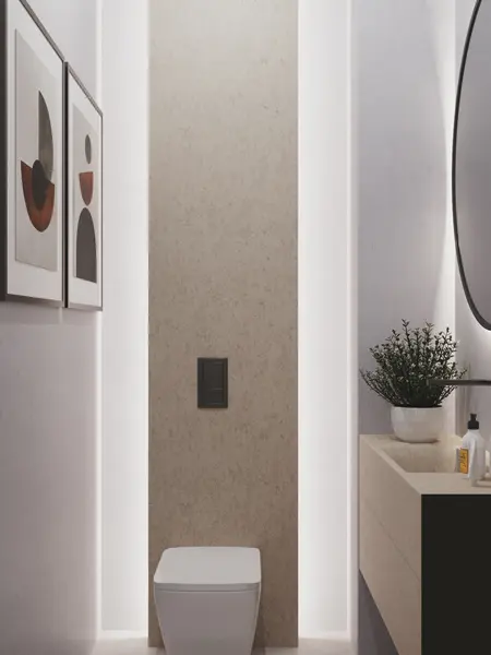 Minimalistyczna toaleta z podświetleniem, nowoczesnymi detalami i rośliną.