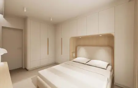 Wnętrze sypialni w stylu japandi i minimalistycznym z jasnymi meblami.