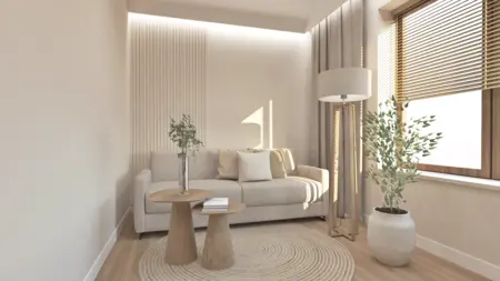 Wnętrze salonu w stylu boho, japandi i skandynawskim z beżową kanapą i drewnianymi elementami.
