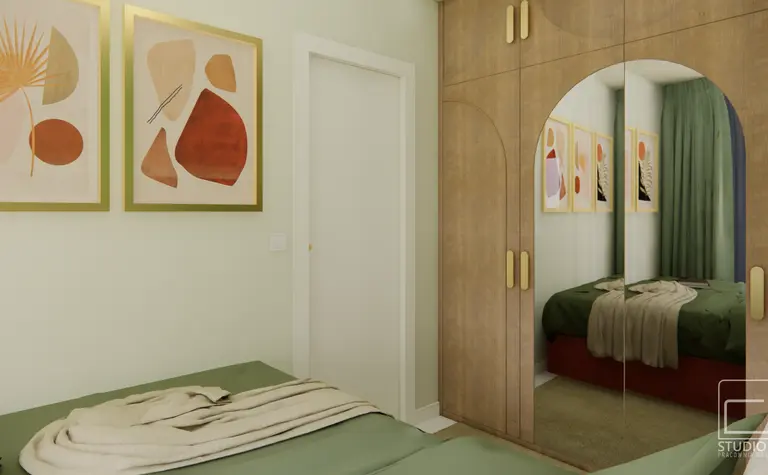 Wnętrze w stylu boho i eklektycznym z zielonymi i drewnianymi elementami.