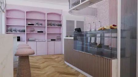 Wnętrze kawiarni z różowymi ścianami, drewnianym blatem i wypiekami, styl dopamine decor.