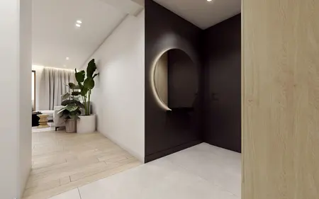 Przedpokój w stylu minimalistycznym z lustrem i rośliną.