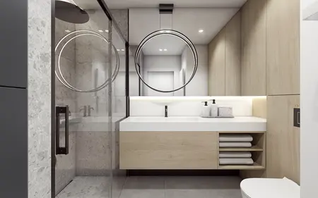 Nowoczesna łazienka z minimalistycznym designem, drewnianymi meblami i eleganckim lustrem.