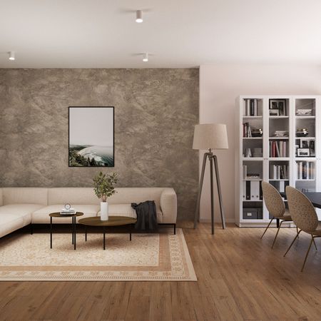 Salon w stylu minimalistycznym z jasną sofą i drewnianymi meblami.