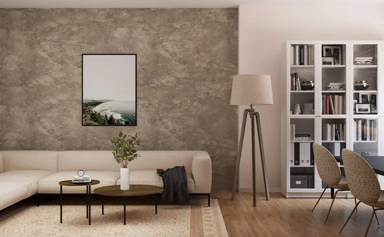 Salon w stylu minimalistycznym z jasną sofą i drewnianymi meblami.