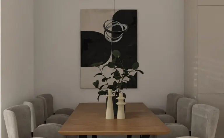 Elegancka jadalnia z drewnianym stołem, szarymi tapicerowanymi krzesłami i minimalistyczną lampą wiszącą nad stołem.